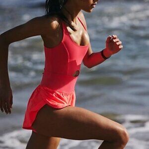 NWOT Free People Righteous Runsie Electric Sunset